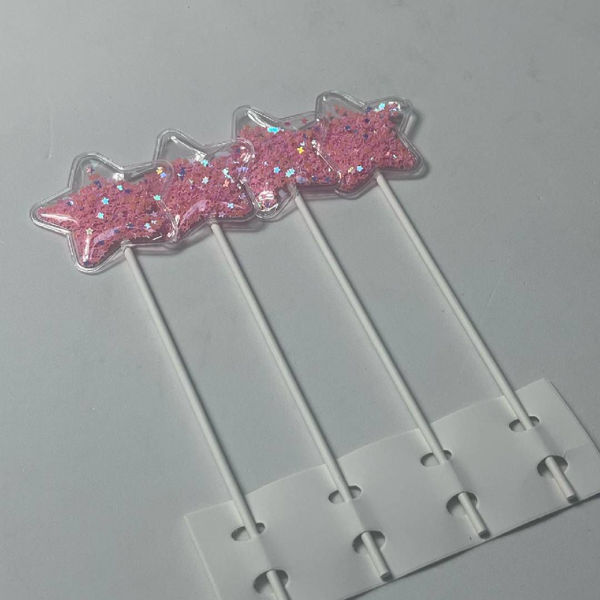Imagen de Pincho Torta Estrella Transparente con Estrellitas x 4